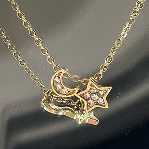 Gold moon and star necklace
